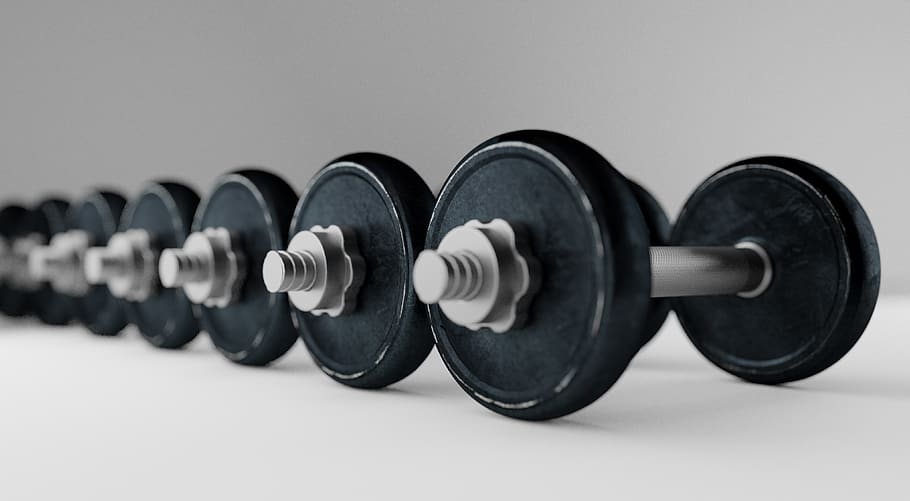 How Slow Living Can Boost Your Workout Routine: Easy Fitness Tips for a Balanced Life 1 dumbell barbell bodybuilding equipment